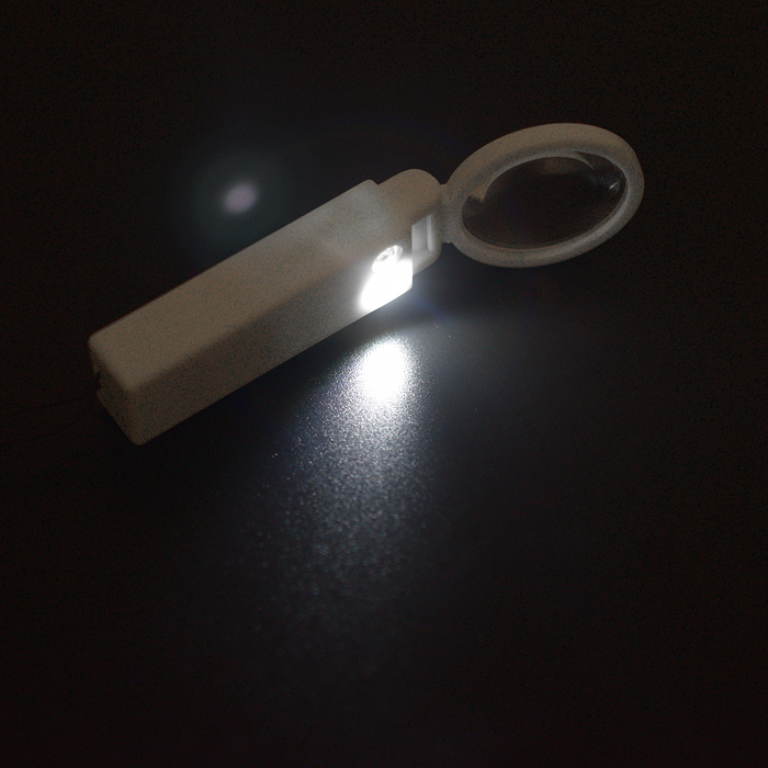 Фото к товару Игрушечный фонарик 00-2960 с лупой Игрушечный фонарик 00-2960 с лупой