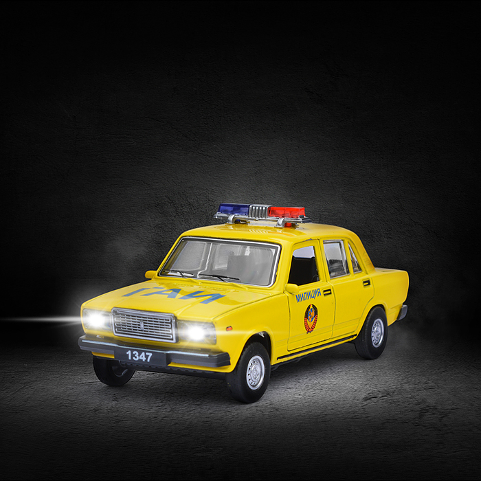 Фото к товару Машина металл ВАЗ-2107 Полиция 12 см, (св-зв, дв, баг,ин, желтый) инерц., в коробке Машина металл ВАЗ-2107 Полиция 12 см, (св-зв, дв, баг,ин, желтый) инерц., в коробке
