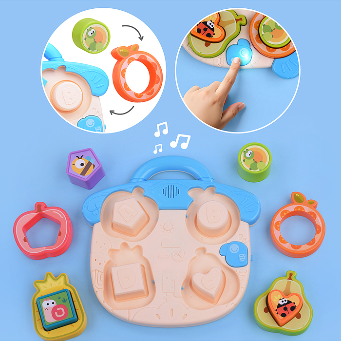 Фото к товару Развивающая музыкальная игрушка HE8089 для познавания форм "Фрукты" в коробке Развивающая музыкальная игрушка HE8089 для познавания форм "Фрукты" в коробке