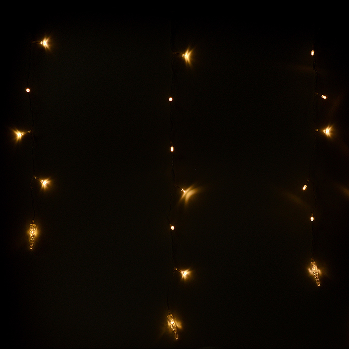 Фото к товару Электрогирлянда-занавес, светодиодная "Сосульки" 3м, 96 ламп, теплый Электрогирлянда-занавес, светодиодная "Сосульки" 3м, 96 ламп, теплый