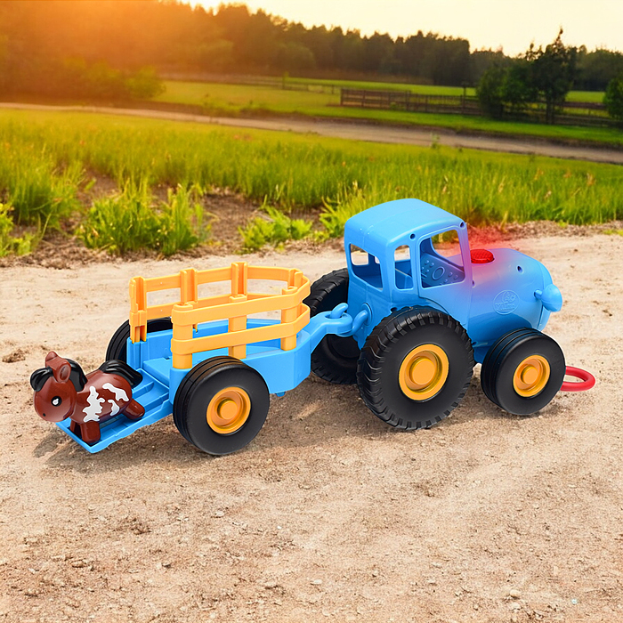 Фото к товару Каталка с прицепом "Синий трактор" 35+ песен Каталка с прицепом "Синий трактор" 35+ песен